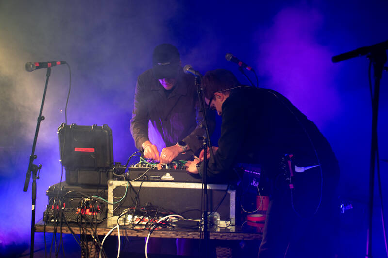 Both players at the rig in purple smoke